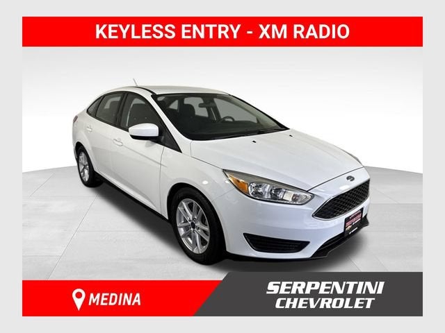 2018 Ford Focus SE in White — front three-quarter view