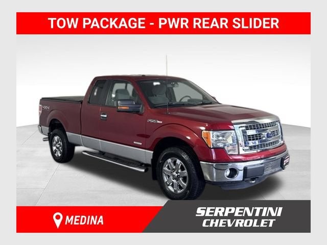 2013 Ford F-150 XL in Red — front three-quarter view