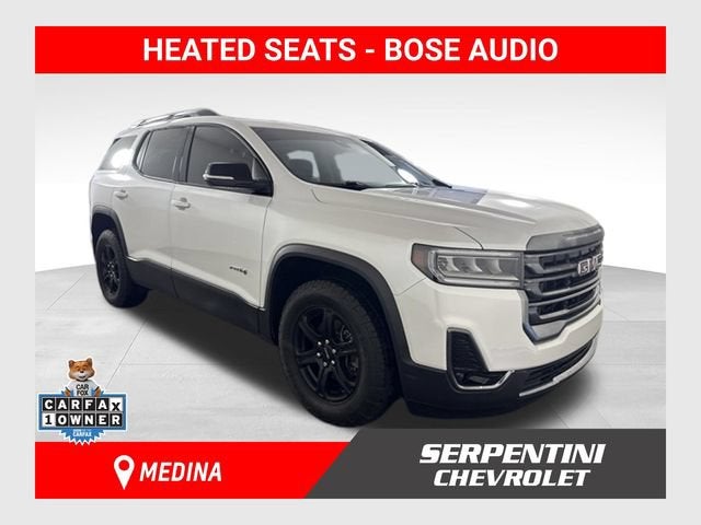 2023 GMC Acadia AT4 in White Frost Tricoat — front three-quarter view