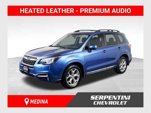 2018 Subaru Forester Touring in Blue — front three-quarter view