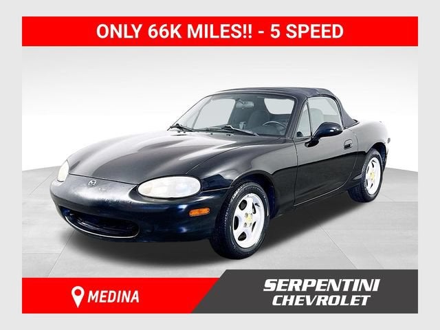 1999 Mazda Mazda MX-5 Miata Base in Black — front three-quarter view