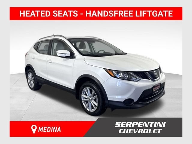 2018 Nissan Rogue Sport SV in White — front three-quarter view