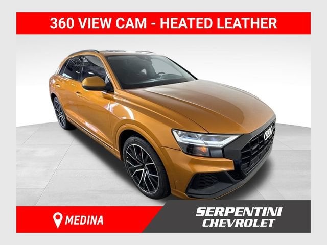 2021 Audi Q8 Premium Plus in Orange — front three-quarter view