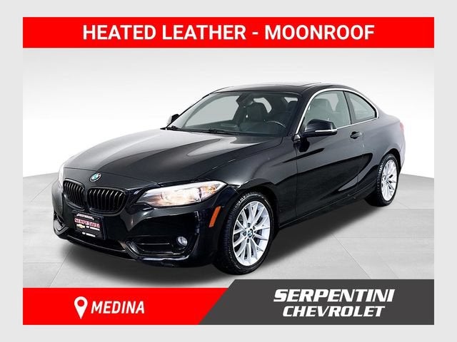2016 BMW 2 Series 228i xDrive in Black — front three-quarter view